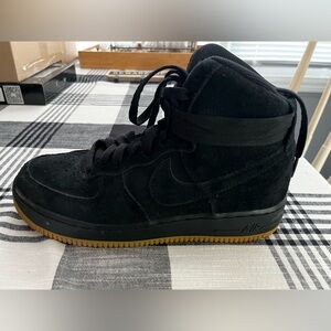 Youth black Nike Air high tops. Would be a size 8 in women’s.